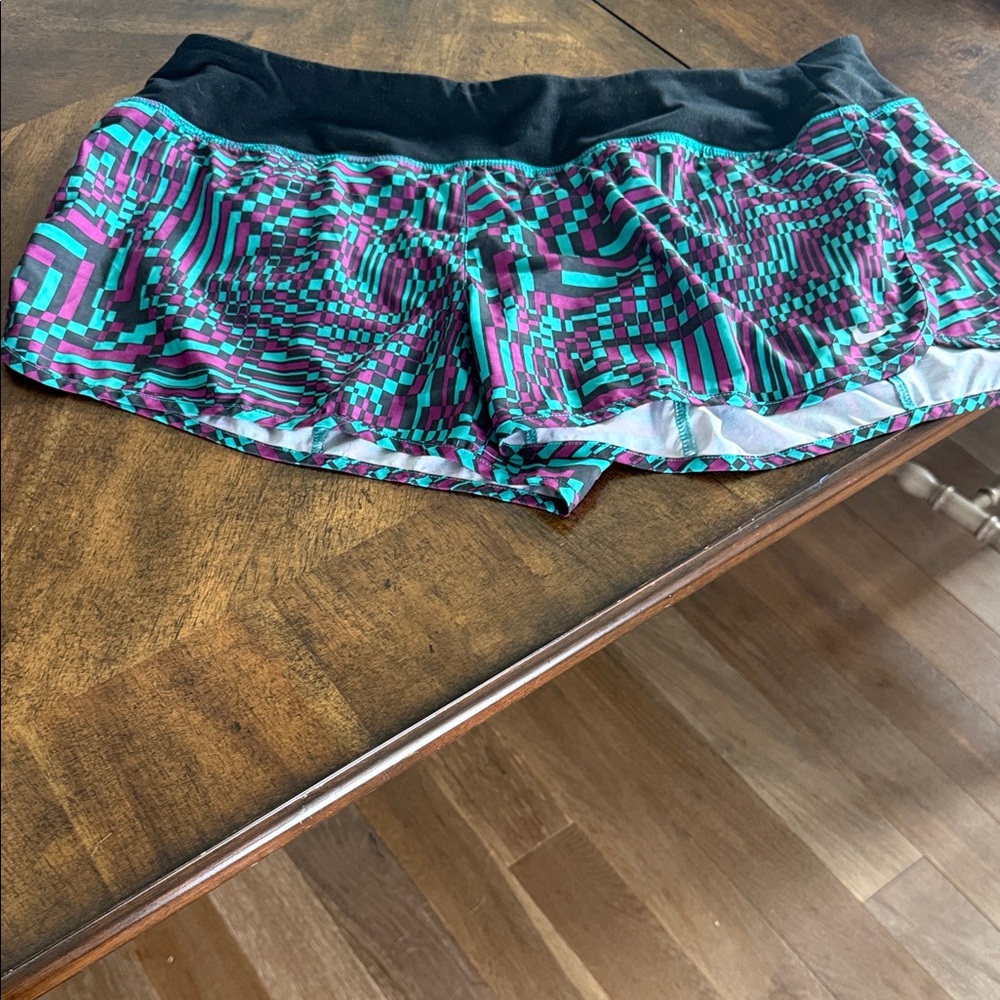 Nike Women's Black and Teal Patterned Athletic Shorts